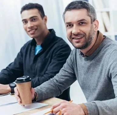 Two men sitting with coffee Two men sitting with coffee